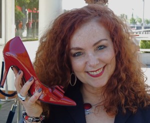 Mariela headshot with red shoe